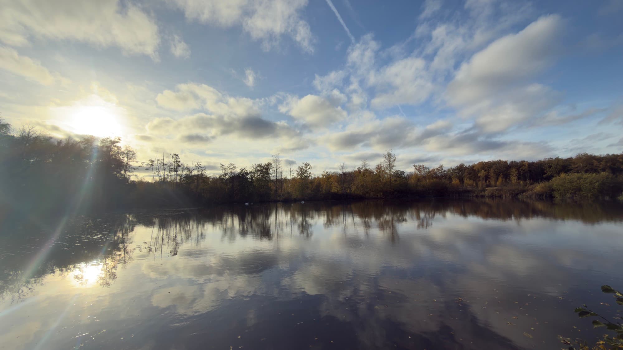 Sunset reflections on a De Wijers pond in autumn