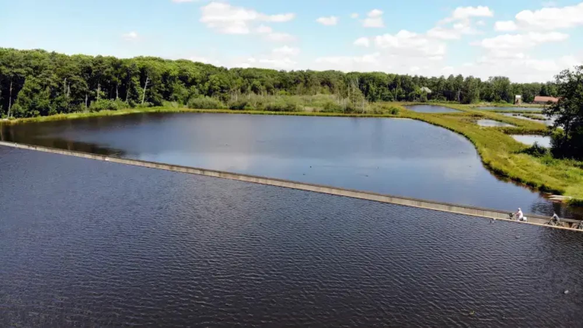 Aerial view of the Cycling Through Water causeway across the pond, Bokrijk