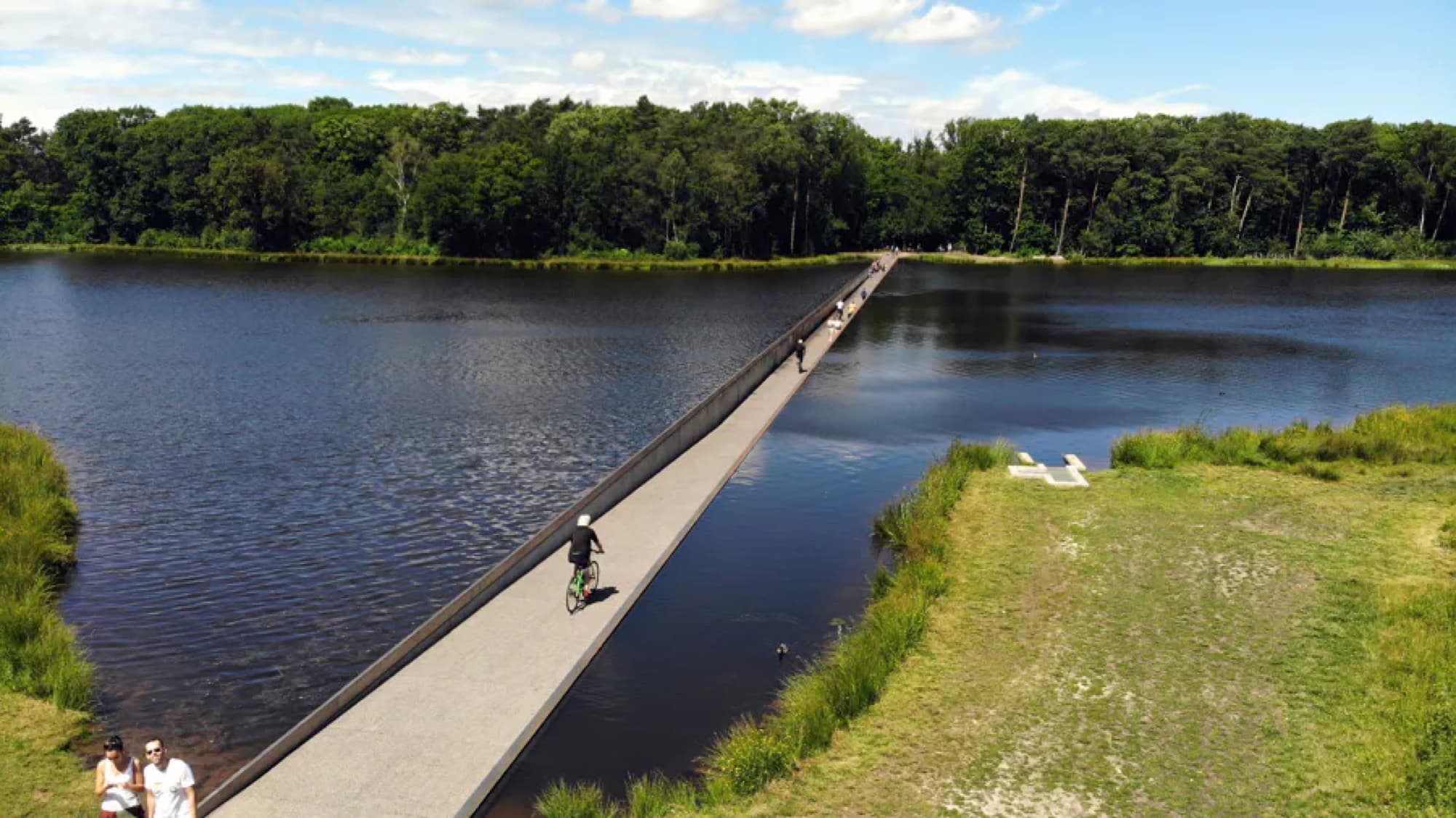 Aerial view of a cyclist on the sunken water path, Bokrijk